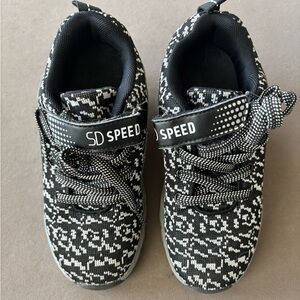 Black and White Kids Heelys Sneakers